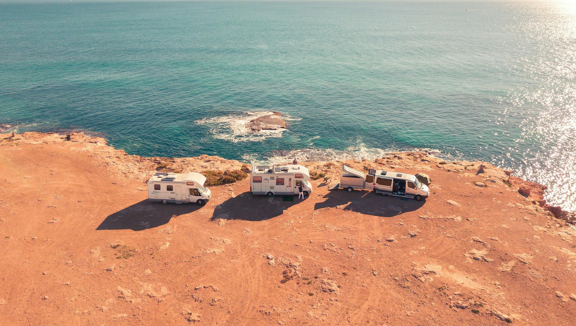 Mobilhomes and campervans parked by the sea